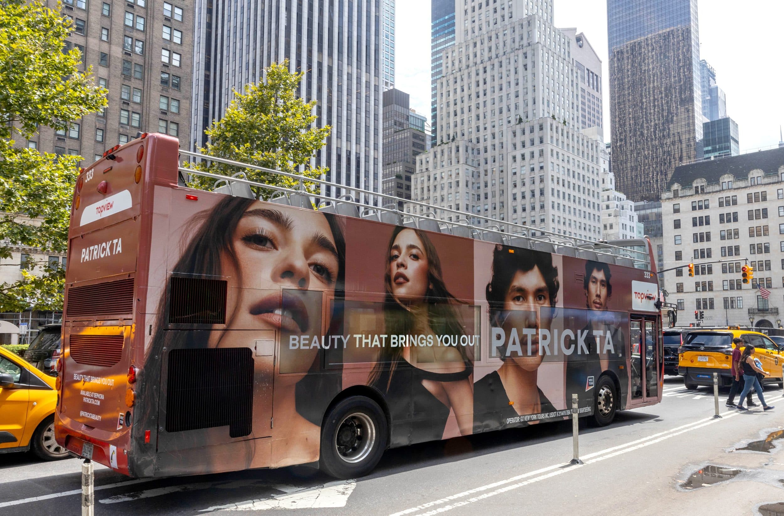 Patrick Ta — Beauty That Brings You Out wrap along a double-decker bus